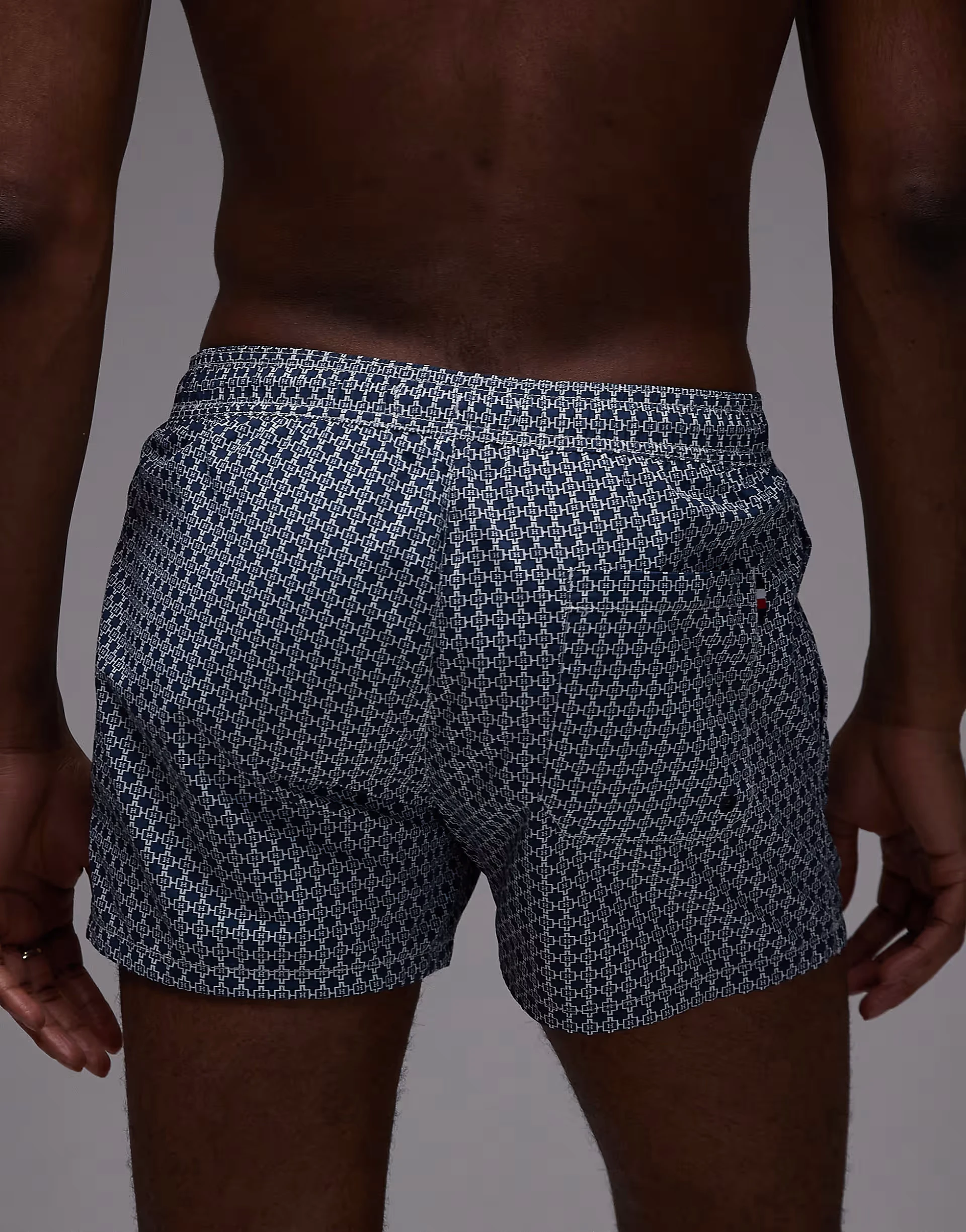 Tommy Hilfiger drawstring swim shorts in blue geo print
