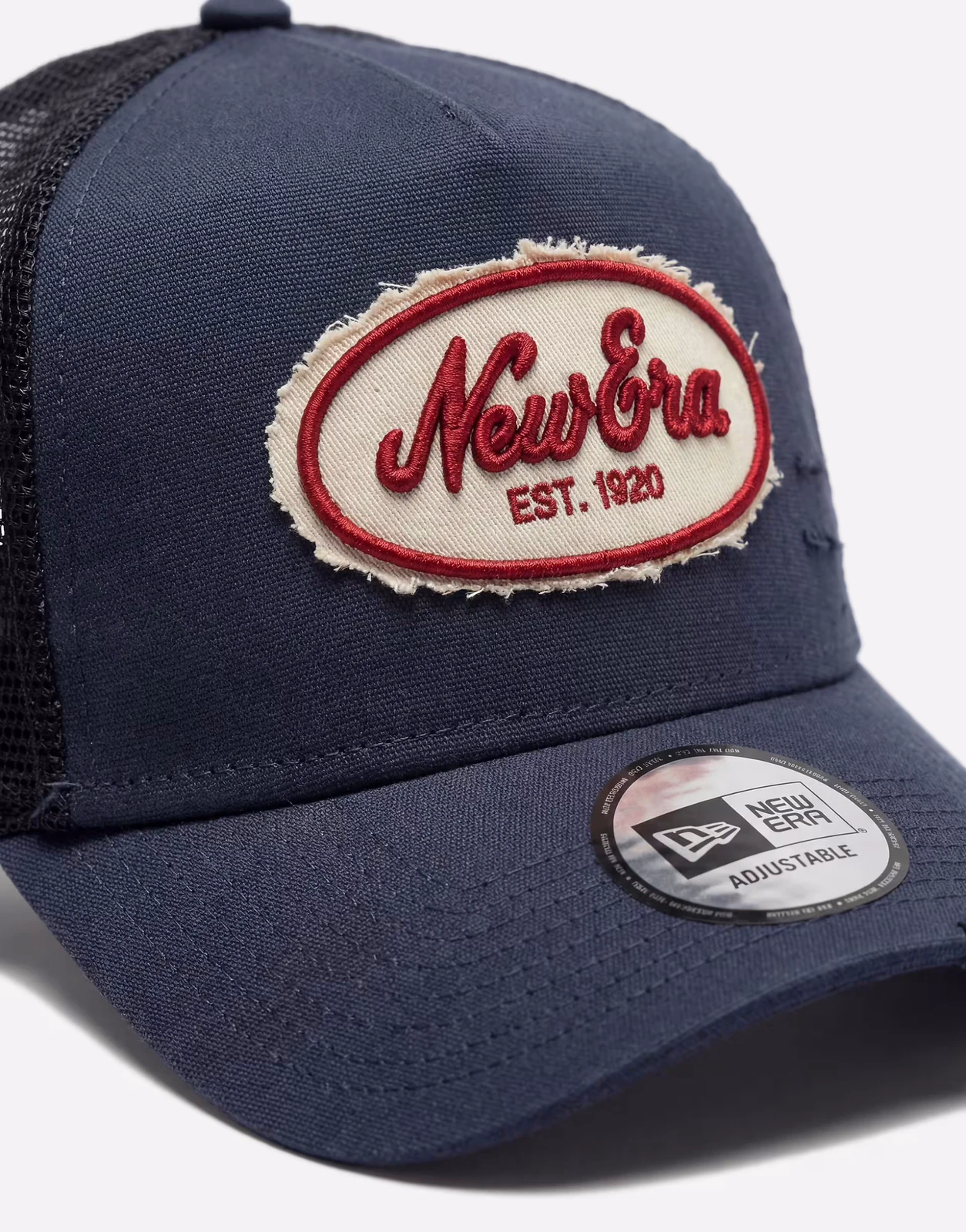 New Era – Trucker-Kappe aus Canvas in Marineblau mit ovalem Aufnäher im Used-Design